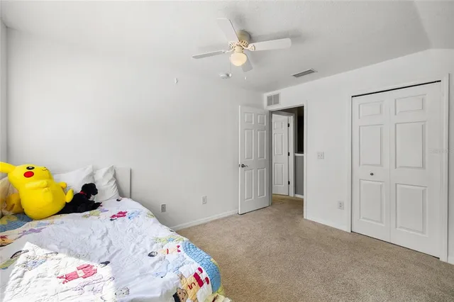 a view of a yard with a large trees