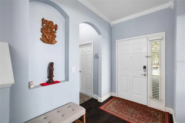 a view of a backyard with swimming pool