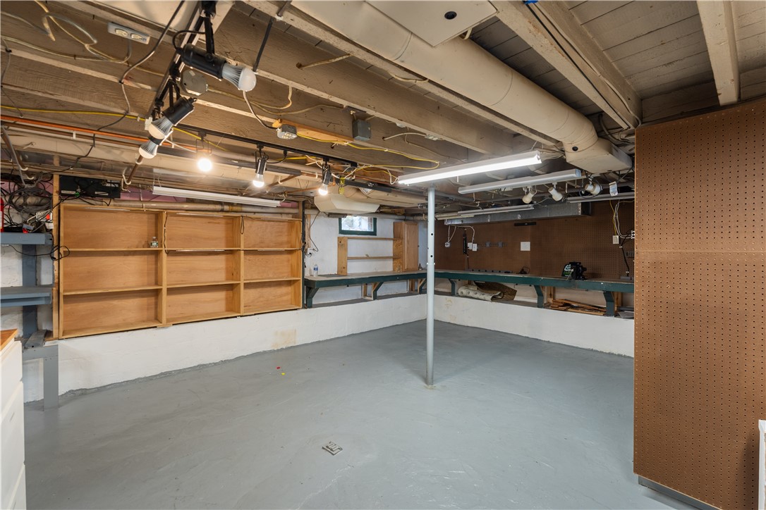 50 Clinton Street Avon, NY 14414 - Photo 36 of 47 Basement with workbench and storage