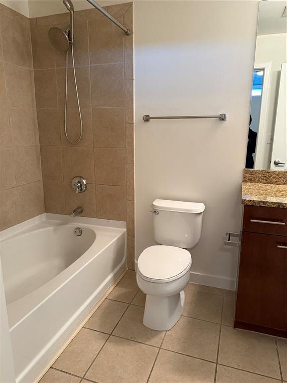 3324 Peachtree Road Northeast, Unit 2406 Atlanta, GA 30326 - Photo 7 of 12 a bathroom with a toilet and a shower