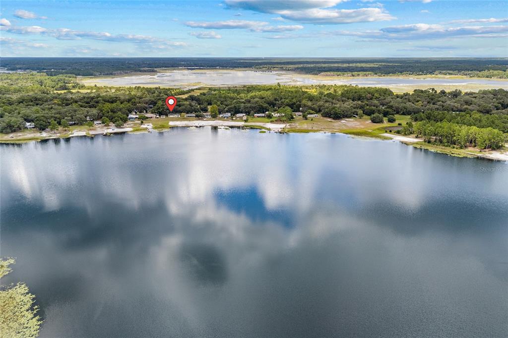 6417 Baker Road Keystone Heights, FL 32656 - Photo 31 of 32 a view of a lake with a mountain view