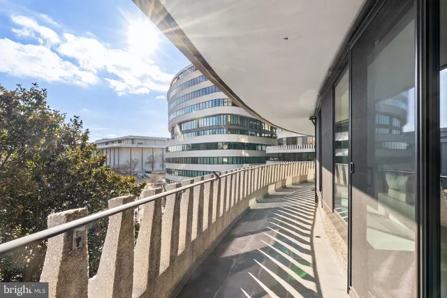 a open kitchen with dining table and chairs