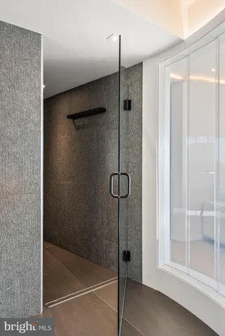 a close view of a utility room with dryer and washer