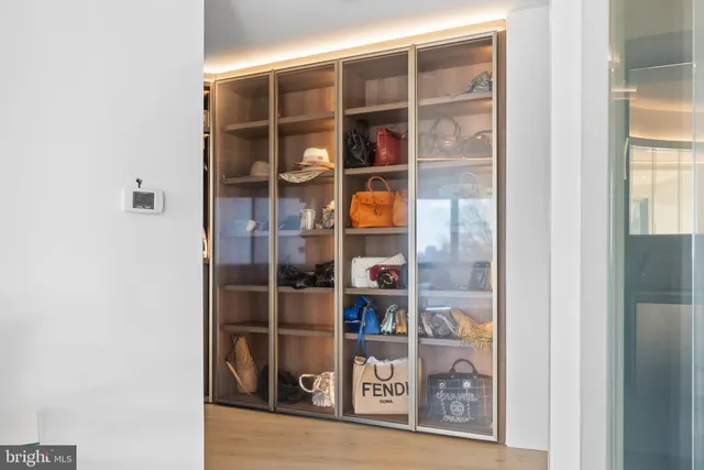 a white tub sitting next to a window