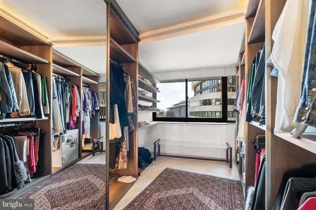 a living room with large windows