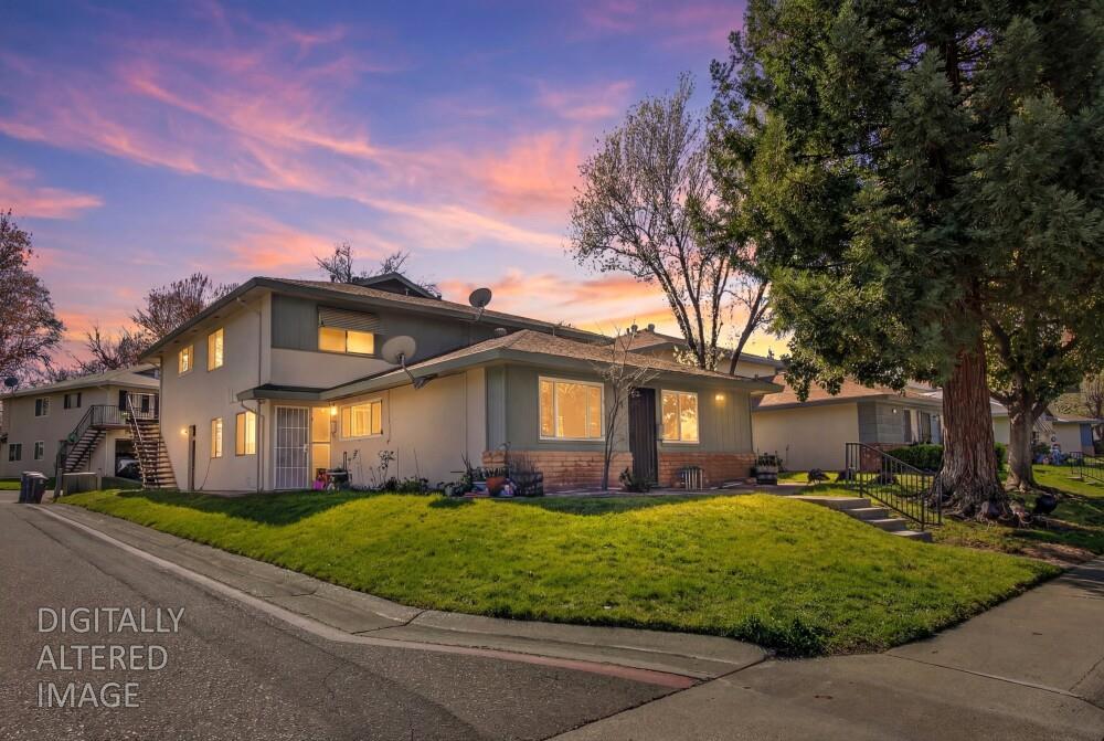 6286 Cavan Drive, Unit 4 Citrus Heights, CA 95621 - Photo 1 of 1 a front view of house with yard and green space
