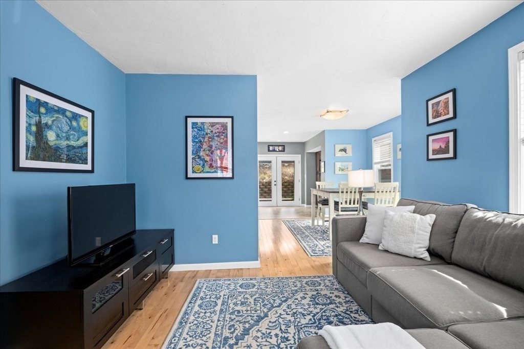 126 Beaconsfield Road Worcester, MA 01602 - Photo 13 of 42 a living room with furniture and a flat screen tv