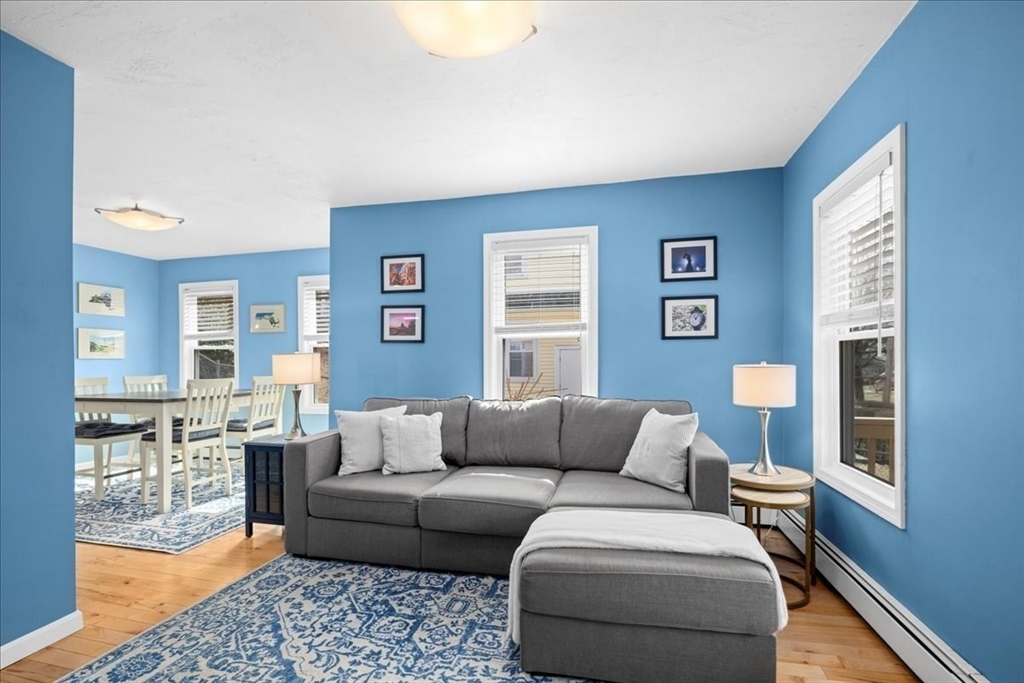 126 Beaconsfield Road Worcester, MA 01602 - Photo 14 of 42 a living room with furniture and a couch