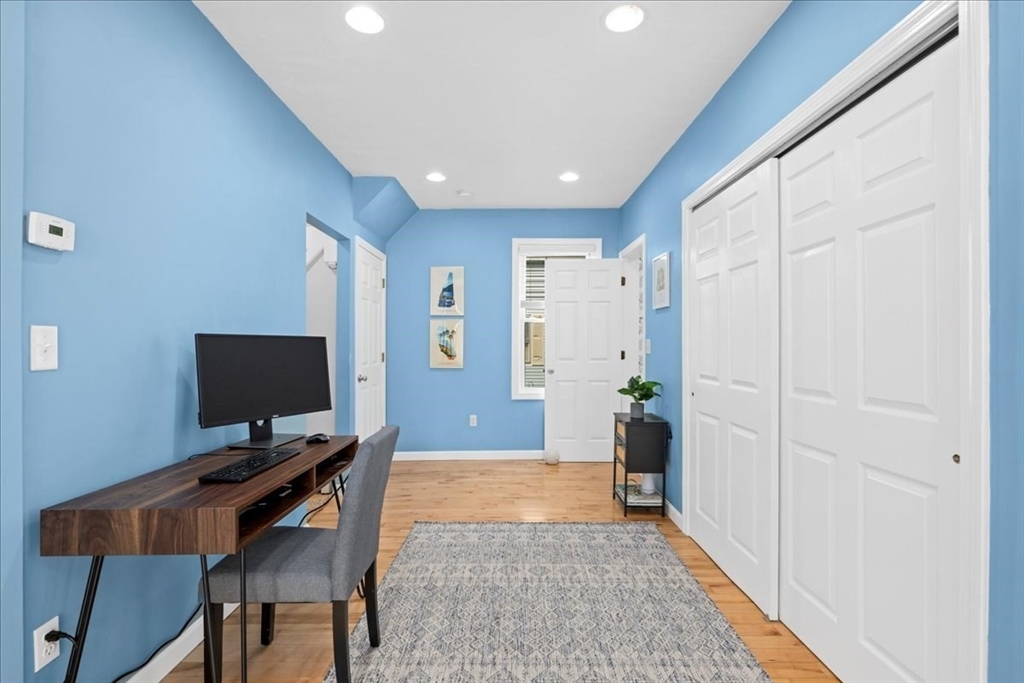 126 Beaconsfield Road Worcester, MA 01602 - Photo 15 of 42 a view of a workspace with furniture and a window