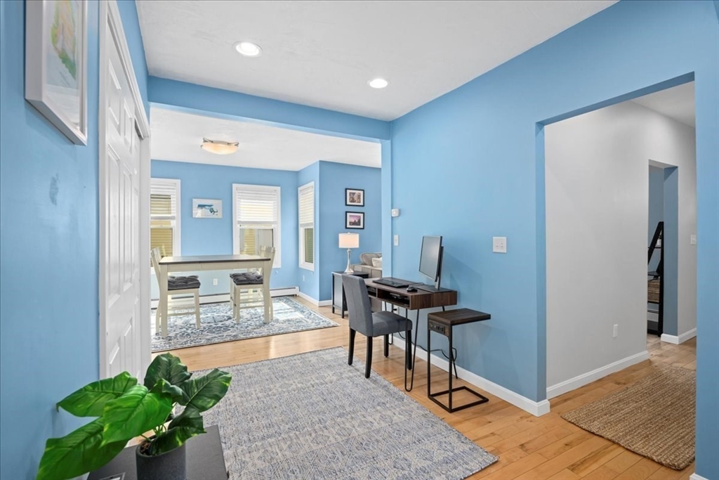 126 Beaconsfield Road Worcester, MA 01602 - Photo 16 of 42 a workspace with furniture and a potted plant