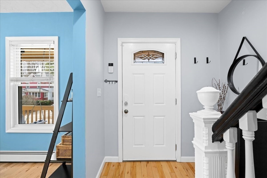 126 Beaconsfield Road Worcester, MA 01602 - Photo 17 of 42 a view of a hallway with windows and entryway
