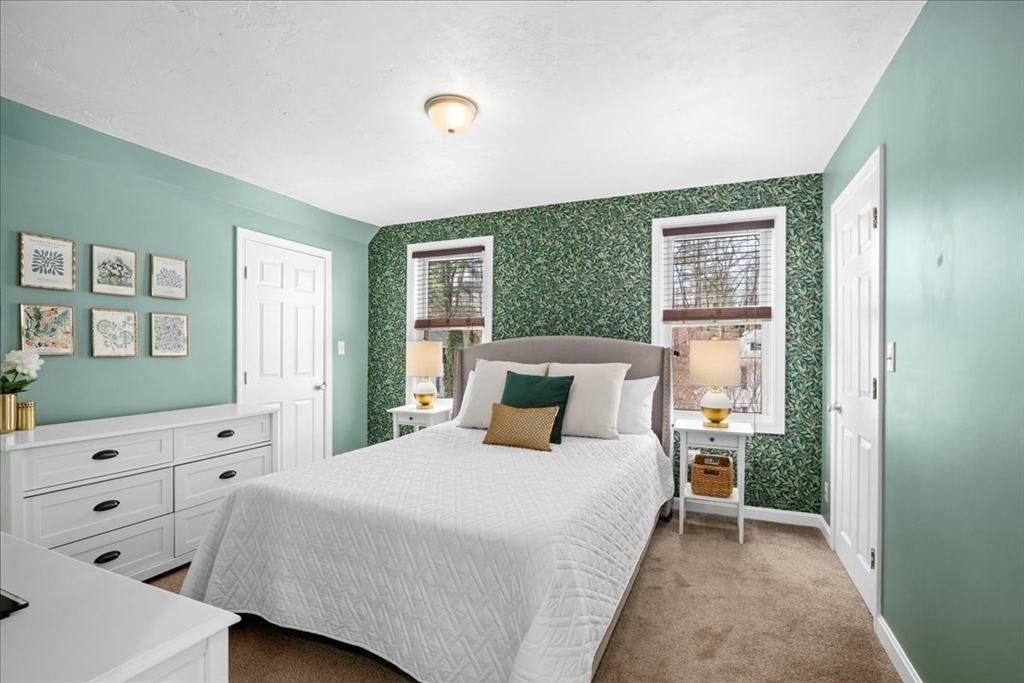 126 Beaconsfield Road Worcester, MA 01602 - Photo 19 of 42 a bedroom with a bed and a window