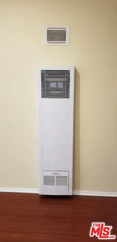 a view of a small space with wooden floor