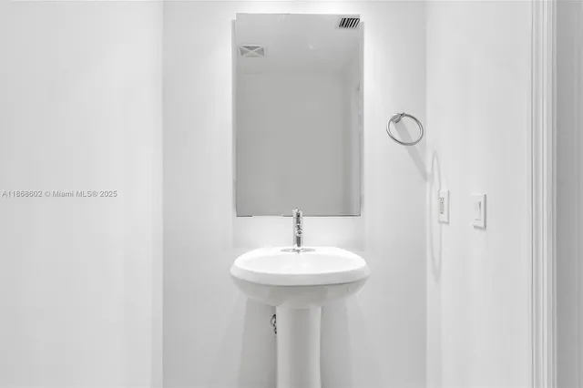 a view of walk in closet with window