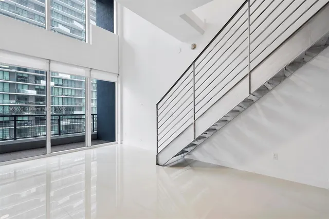 a view of an entryway with stairs