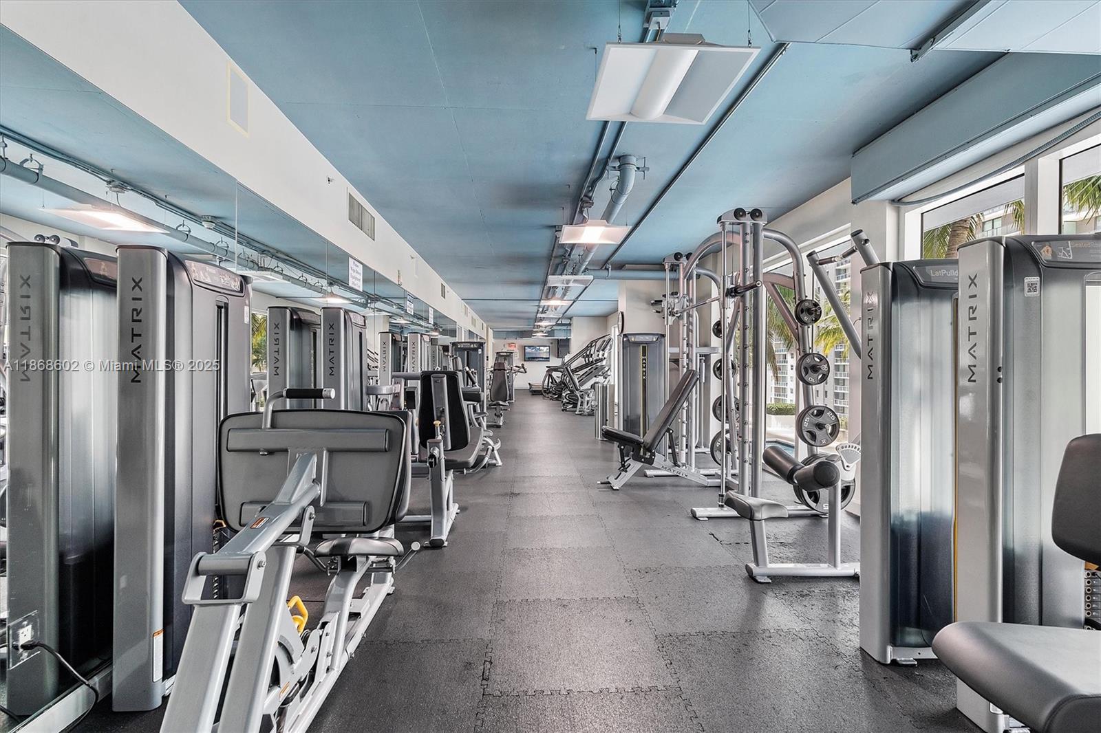 60 Southwest 13th Street, Unit 2420 Miami, FL 33130 - Photo 26 of 33 a view of a room with gym equipment