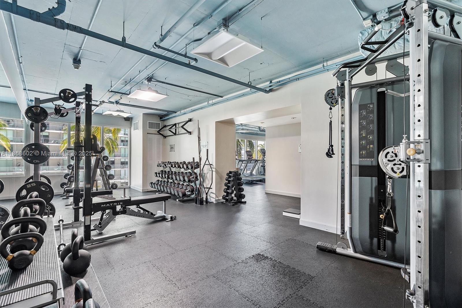 60 Southwest 13th Street, Unit 2420 Miami, FL 33130 - Photo 28 of 33 a view of a room with gym equipment