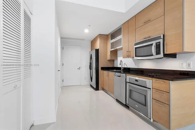 a view of kitchen with utility room
