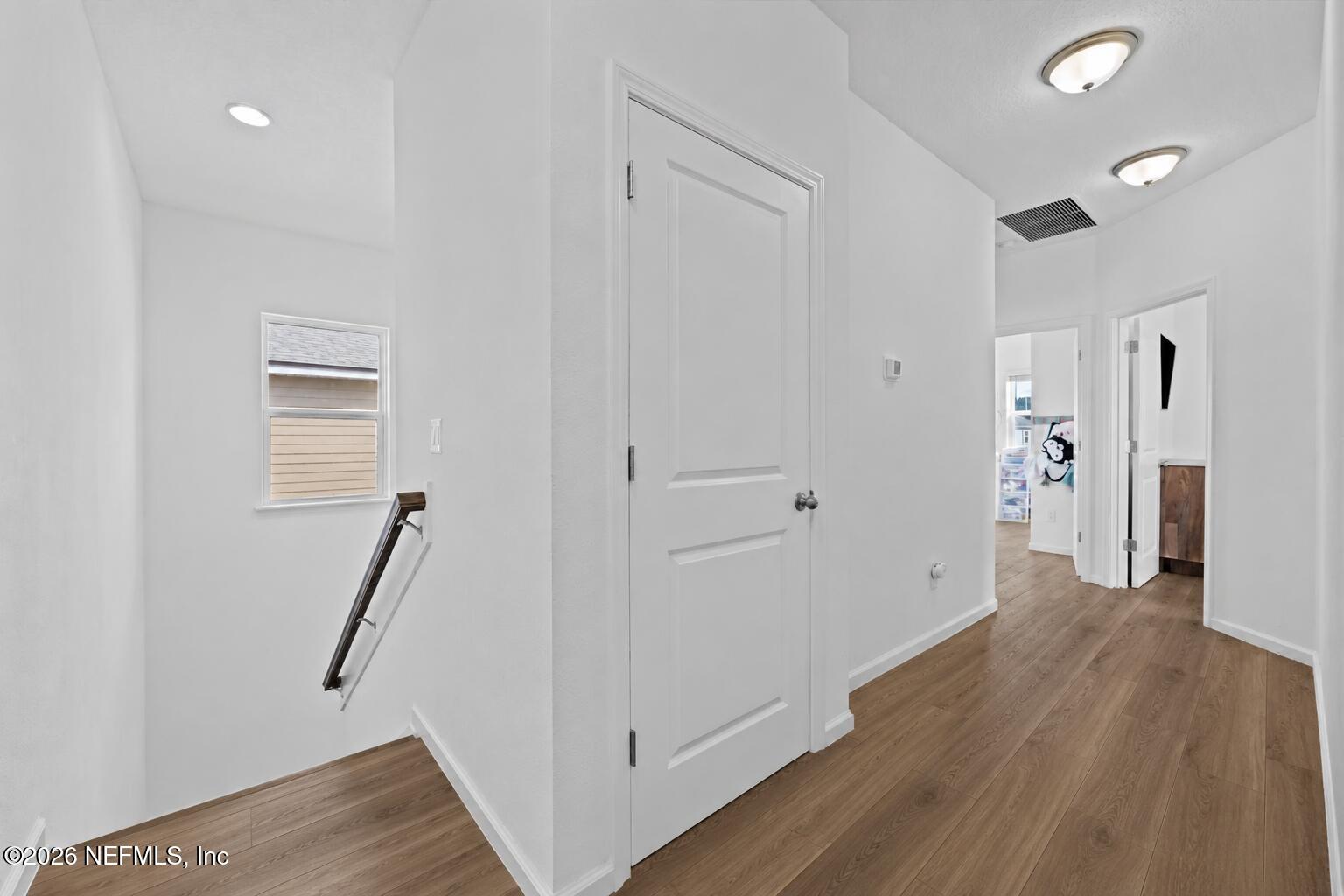 92 Patina Place St. Augustine, FL 32092 - Photo 17 of 26 a view of entryway with wooden floor