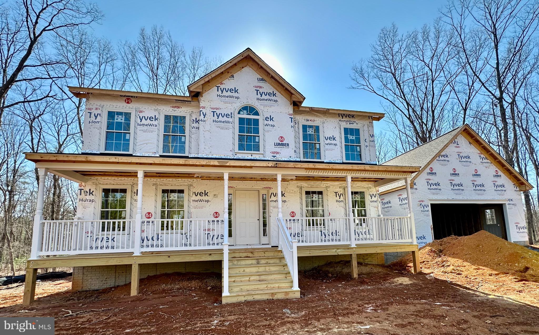12267 Autumn Ridge Lane Unionville, VA 22567 - Photo 2 of 5 a view of a house with a yard