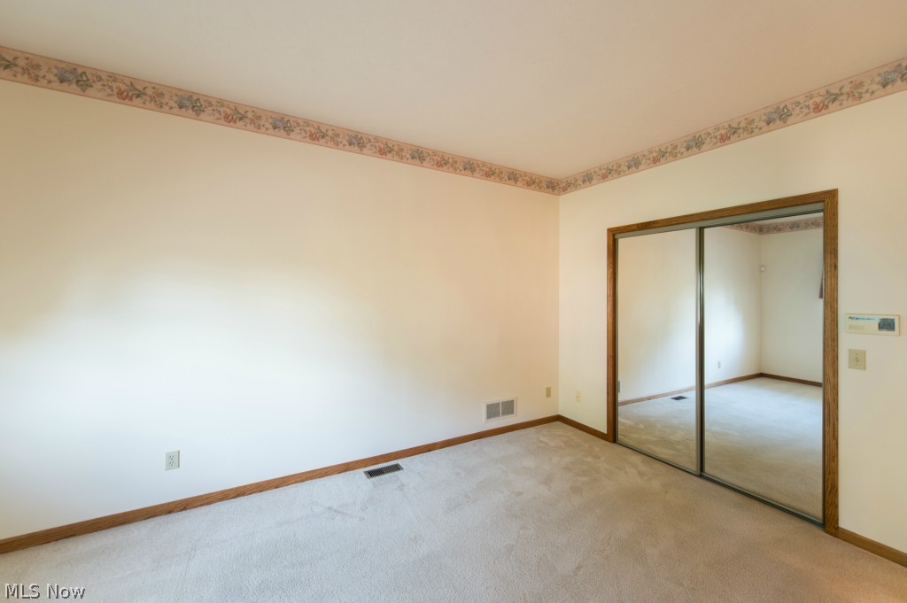 2423 Charing Cross Road Northwest, Unit 79 Canton, OH 44708 - Photo 17 of 25 Master Bedroom With Large Closet