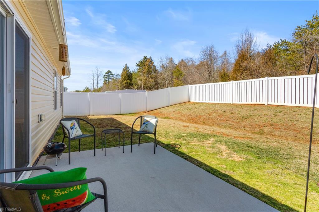 6413 Bentbrush Street Rural Hall, NC 27045 - Photo 26 of 31 Fenced in back yard with nice patio!!