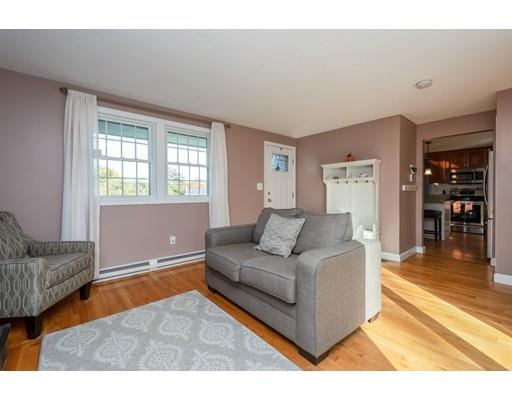 20 Launching Road Andover, MA 01810 - Photo 14 of 33 a living room with furniture and a couch