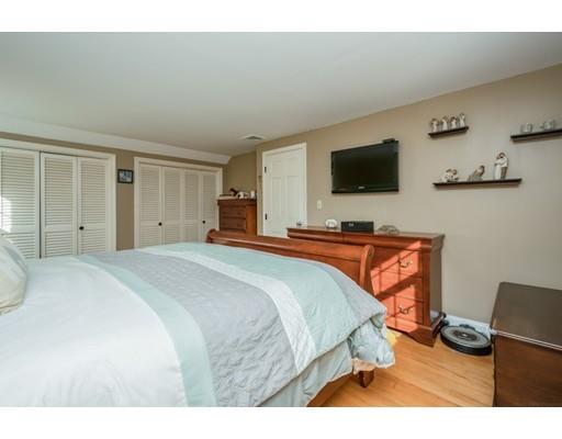 20 Launching Road Andover, MA 01810 - Photo 17 of 33 a bedroom with a bed and a flat screen tv