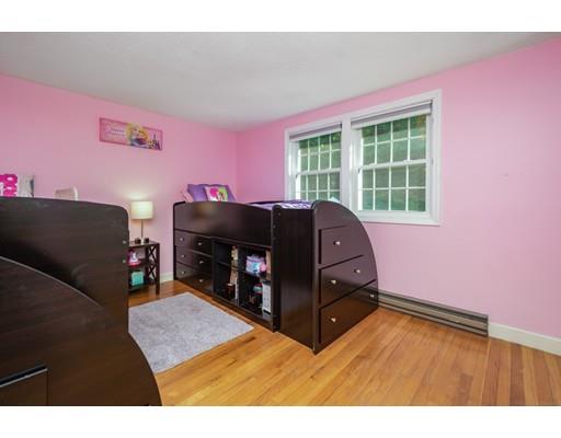 20 Launching Road Andover, MA 01810 - Photo 18 of 33 a living room with furniture and a fireplace