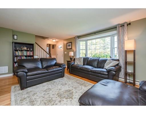 20 Launching Road Andover, MA 01810 - Photo 2 of 33 a living room with a couch and a window
