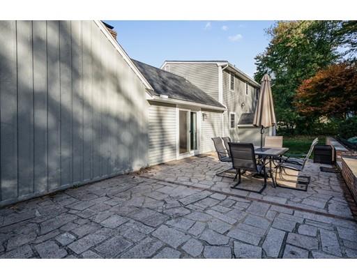 20 Launching Road Andover, MA 01810 - Photo 25 of 33 a backyard of a house with table and chairs