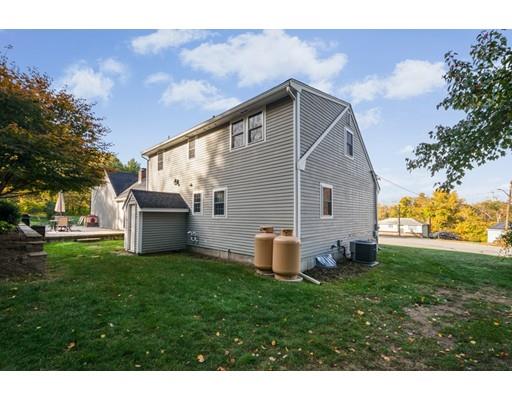 20 Launching Road Andover, MA 01810 - Photo 29 of 33 a backyard of a house with table and chairs