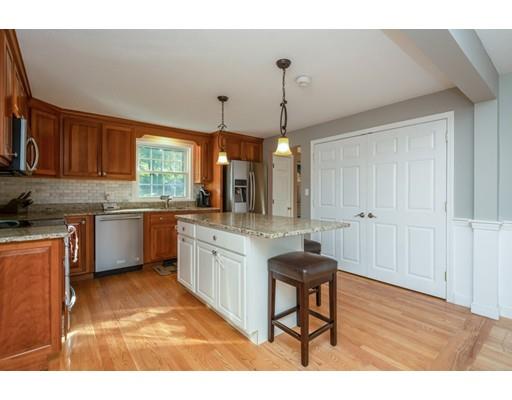 20 Launching Road Andover, MA 01810 - Photo 10 of 33 a kitchen with stainless steel appliances granite countertop a sink and cabinets