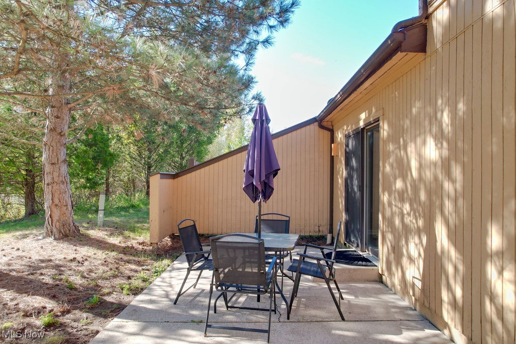 1426 Loop Road, Unit 1426 Kent, OH 44240 - Photo 33 of 40
Another view of patio with outdoor dining space. So private and great space to have BBQ or relax.