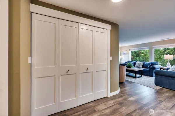 a view of a livingroom with furniture and window