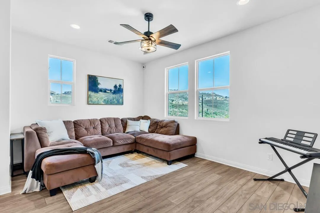 2811 Safflower Street Spring Valley, CA 91977 - Photo 11 of 28 a living room with furniture and a window