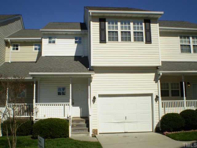 4222 Standing Rock Way Raleigh, NC 27604 - Photo 1 of 9 a front view of a house with a yard