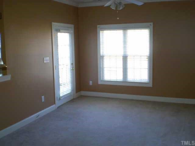 4222 Standing Rock Way Raleigh, NC 27604 - Photo 2 of 9 an empty room with a window