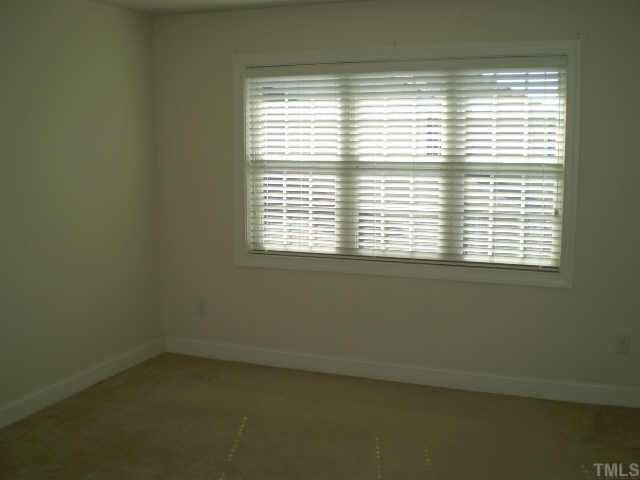 4222 Standing Rock Way Raleigh, NC 27604 - Photo 6 of 9 a view of a room that has a window in it