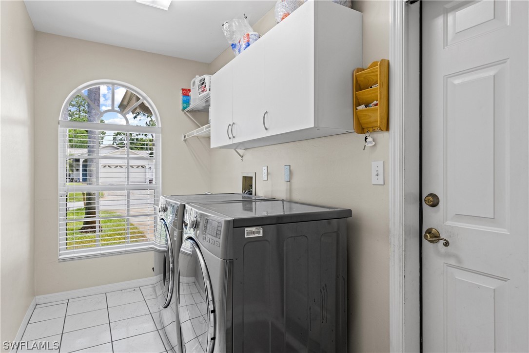 9132 Bryant Road Fort Myers, FL 33967 - Photo 19 of 23 a view of cabinets and a window