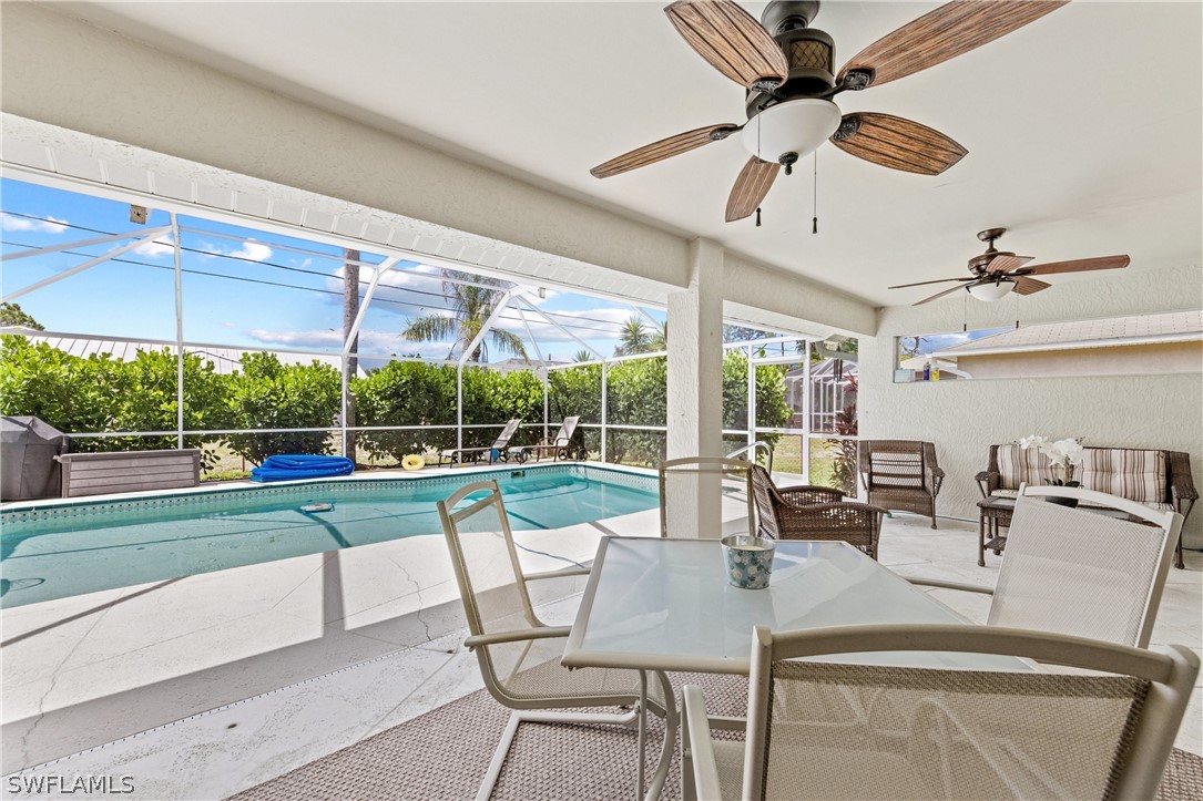 9132 Bryant Road Fort Myers, FL 33967 - Photo 20 of 23 a view of a dining room with furniture window and outside view