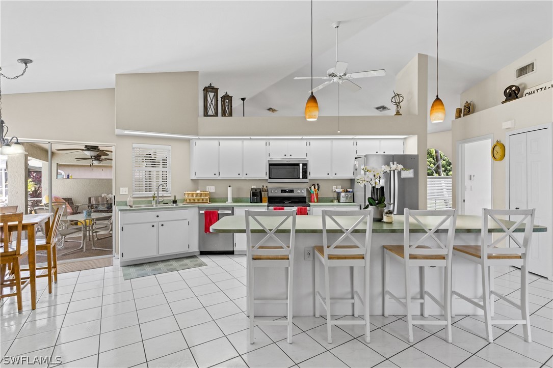 9132 Bryant Road Fort Myers, FL 33967 - Photo 6 of 23 a view of kitchen and center island