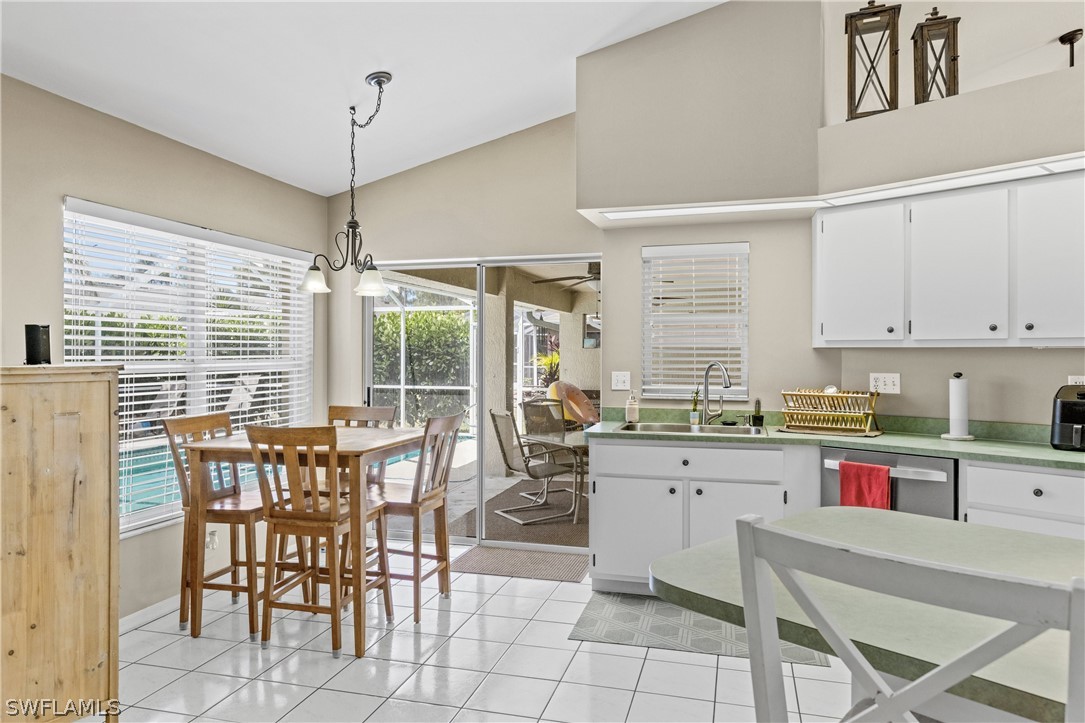 9132 Bryant Road Fort Myers, FL 33967 - Photo 8 of 23 a view of a dining room with furniture window and outside view