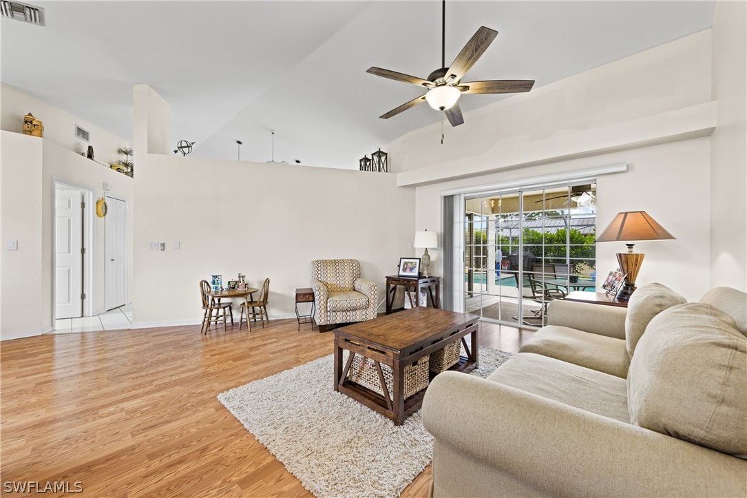 9132 Bryant Road Fort Myers, FL 33967 - Photo 10 of 23 a living room with furniture and a large window