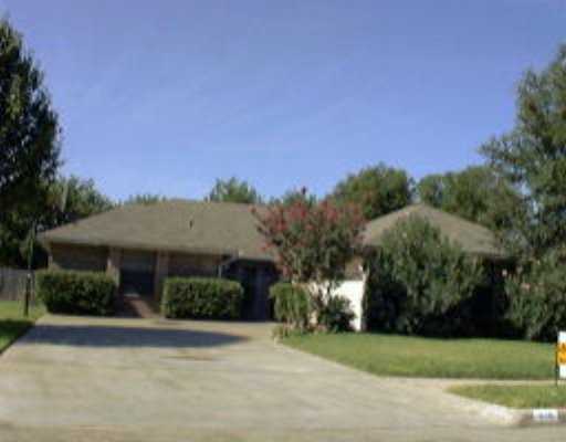 505 Cedar Ridge Drive Pflugerville, TX 78660 - Photo 1 of 1 a front view of a house with a yard and garage