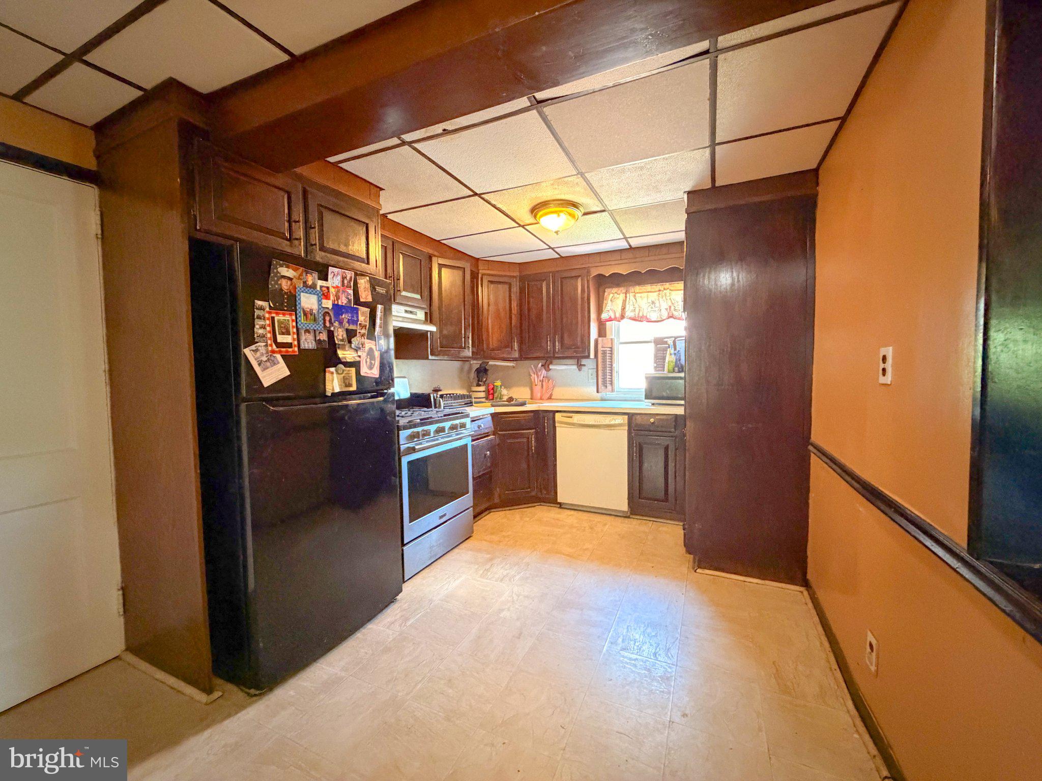 646 Amosland Road Morton, PA 19070 - Photo 5 of 11 Cozy kitchen with warm wood accents.