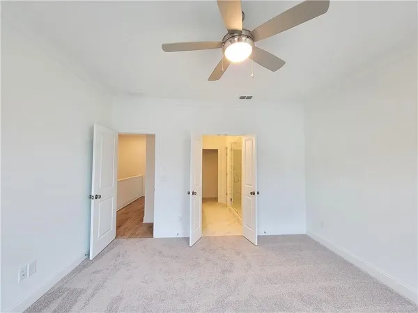 an empty room with a bathroom