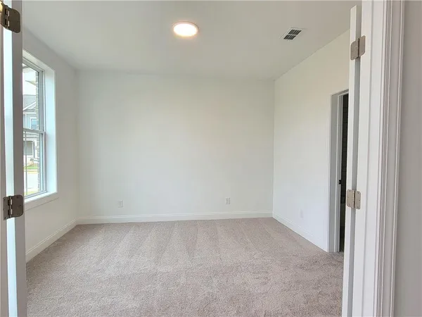 an empty room with windows