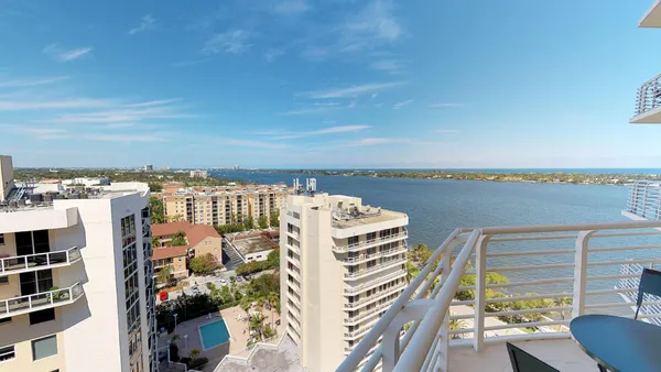 a view of a city with tall buildings