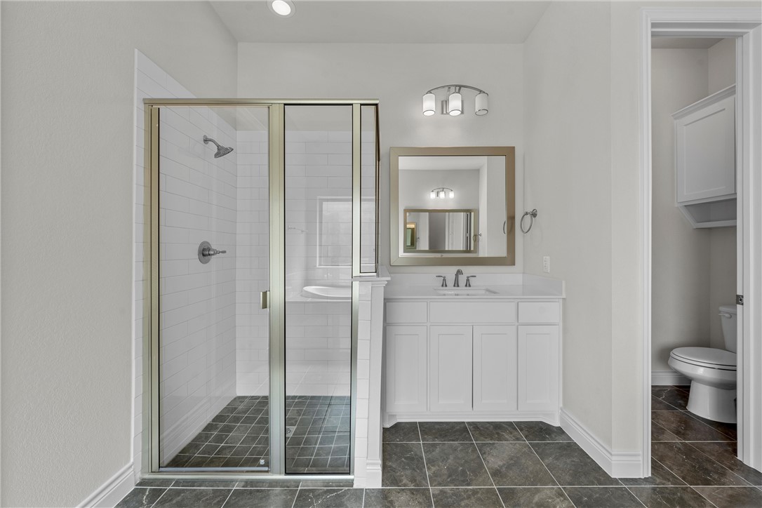 6402 Waggoner Court Temple, TX 76502 - Photo 16 of 30 a bathroom with a shower and a toilet